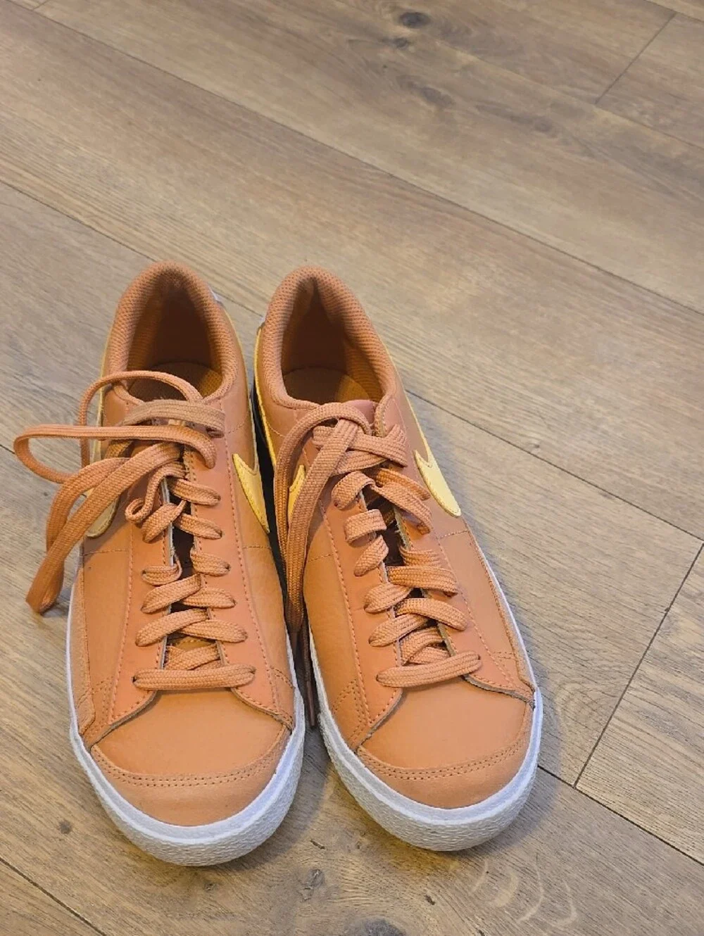 Nike Kids Low-Top Sneakers in Burnt Orange with Yellow Swoosh